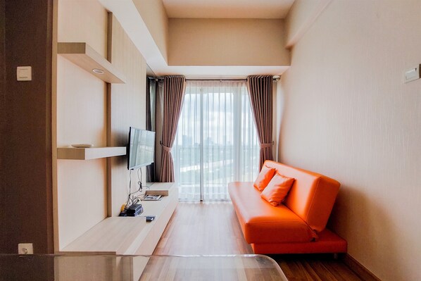 Deluxe Apartment, 1 Bedroom | Living area - Simply Look And Homey 1Br At Casa De Parco Apartment (Pagedangan)