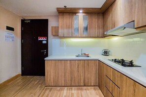 Departamento Deluxe, 1 habitación | Cocina privada | Refrigerador con congelador y parrilla de estufa 