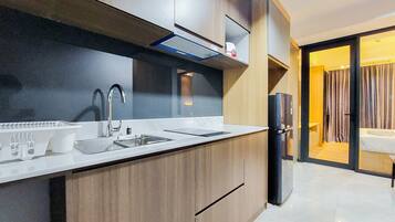 Deluxe Apartment, 1 Bedroom | Private kitchen | Full-size fridge, stovetop
