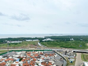 City view from property - Great Choice Studio Tokyo Riverside Pik 2 Apartment (Teluknaga)