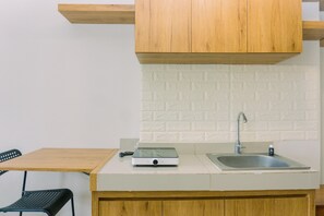 Deluxe Studio | Private kitchen | Full-size fridge, stovetop - Comfy And Nice Designed Studio Parkland Avenue Apartment (South Tangerang)