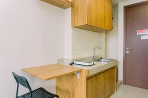 Deluxe Studio | Private kitchen | Full-size fridge, stovetop - Comfy And Nice Designed Studio Parkland Avenue Apartment (South Tangerang)