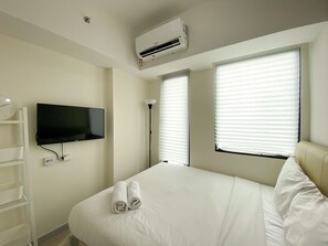 Individually decorated, individually furnished - Modern Studio (No Kitchen) Apartment At Osaka Riverview Pik 2 (Kosambi)