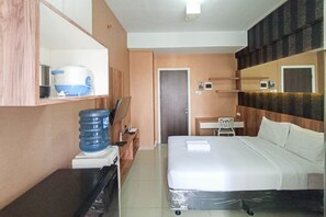 Deluxe Studio | Individually decorated, individually furnished, free WiFi - Classic Studio At Student Castle Yogyakarta Apartment (Depok)