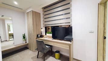 Standard Double Room | Minibar, in-room safe, blackout drapes, iron/ironing board