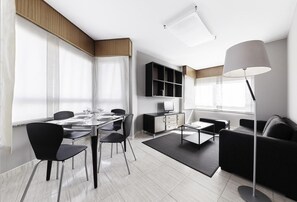 Apartment, 2 Bedrooms | Living area | 24-inch flat-screen TV with cable channels, TV - Someso Apartamentos Turísticos (A Coruña)