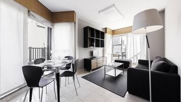 Apartment, 2 Bedrooms | Living area | 24-inch flat-screen TV with cable channels, TV