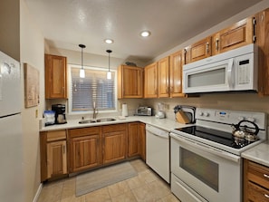 Apartment, 2 Bedrooms | Private kitchen | Fridge, coffee/tea maker, toaster