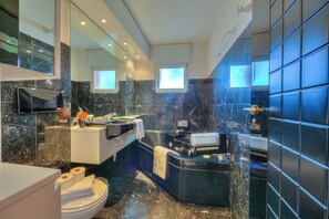 Standard Apartment, Multiple Bedrooms, Refrigerator & Microwave (Residenza Borgo Rustico) | Bathroom | Separate tub and shower, hair dryer, towels, soap