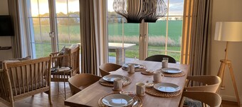 Dream thatched house with water view - 3 bedrooms - 10 min. walk to the beach