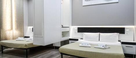 Economy Quadruple Room | Free WiFi, bed sheets