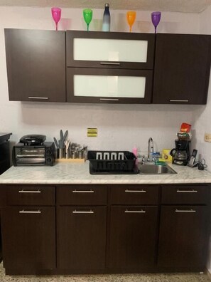 Fridge, microwave, stovetop, cookware/dishes/utensils