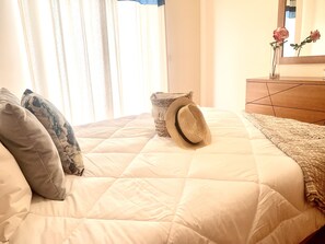 3 habitaciones, tabla de planchar con plancha, cuna de viaje y internet 