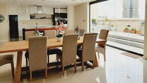 Presidential Penthouse | Living area | 65-inch Smart TV with cable channels, Netflix, streaming services