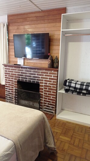 Suite Deluxe, varias camas | 1 habitación, escritorio y wifi gratis