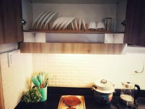 Fridge, microwave, stovetop, cookware/dishes/utensils