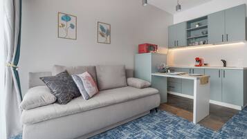 Superior Apartment | Living area | 108-inch Smart TV with digital channels, Netflix, streaming services