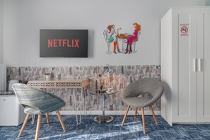 Deluxe kamer, uitzicht op park | Luxe beddengoed, bedden met traagschuimmatrassen