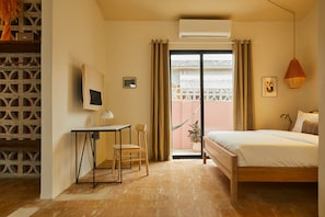 Luxury Studio Suite | Living area | 43-inch Smart TV with digital channels, TV