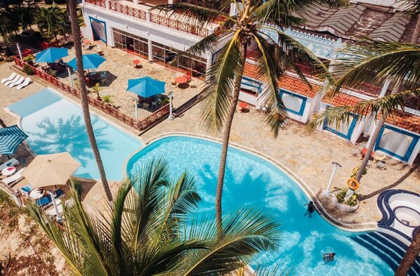 2 outdoor pools, pool umbrellas, pool loungers
