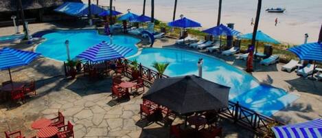2 outdoor pools, pool umbrellas, pool loungers