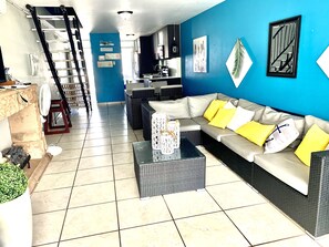 Family Villa | Living area | 50-inch Smart TV with cable channels, TV, Netflix