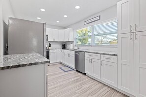 Fridge, microwave, dishwasher, coffee/tea maker