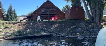 Riverfront home with river & valley views, wood stove, deck, & W/D