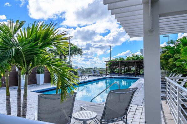 A rooftop pool, a heated pool