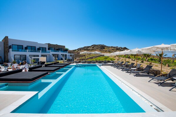 2 outdoor pools, open 9:00 AM to 9:00 PM, pool loungers