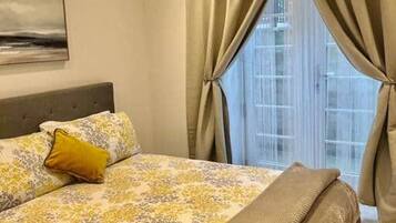 Apartment, 1 Queen Bed | 1 bedroom, iron/ironing board, free WiFi, bed sheets