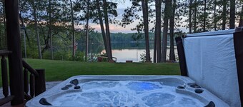 Luxurious Northwoods Log Lake house with over 500ft of lake frontage on 15 acres