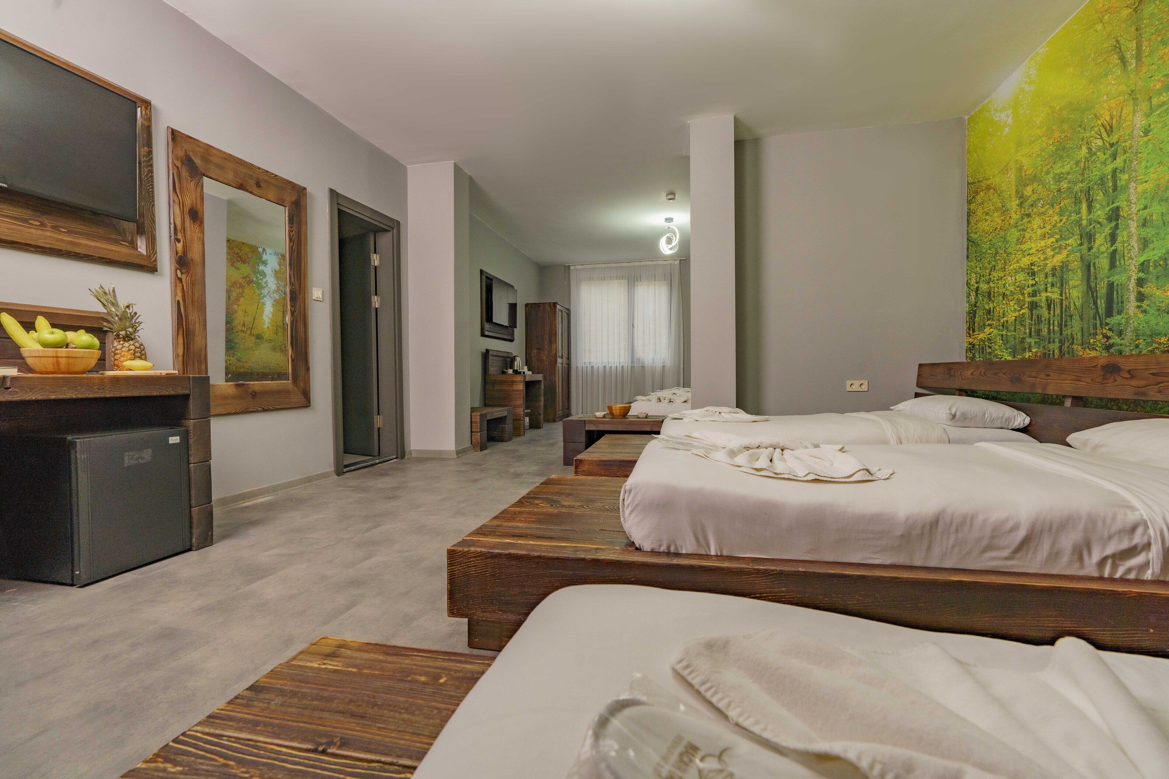 Family Room, Multiple Beds, Non Smoking, River View | Premium bedding, minibar, in-room safe, individually decorated