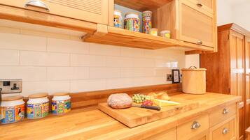 Fridge, electric kettle, toaster, cookware/dishes/utensils