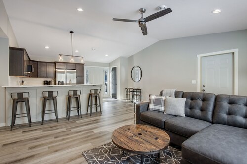 Up North Living!  Fully renovated one-level living home in wooded lot near lake.