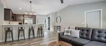 Up North Living! Fully renovated one-level living home in wooded lot near lake.