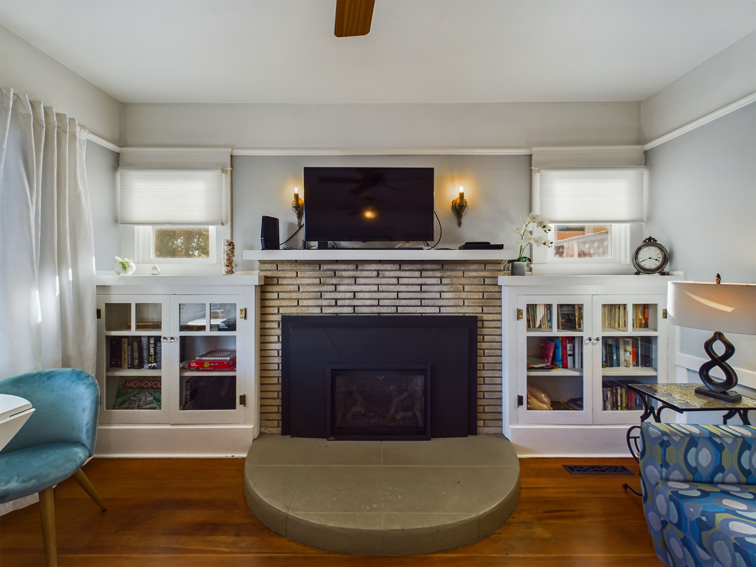 Smart TV, fireplace, books