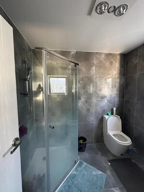 Shower, free toiletries, towels, soap