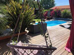 Outdoor pool, a heated pool - Pretty wooden house with jacuzzi, air conditioning, heated pool, bicycles, internet (biscarrosse)