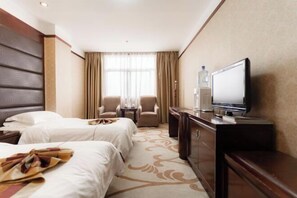A hotel room with two beds, a television, a desk, and a chair. - Pucheng Jinghai Hyatt Hotel (Pucheng)