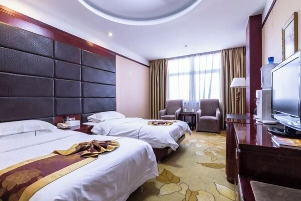 A hotel room with two beds, a desk, a television, and a large window with curtains. - Pucheng Jinghai Hyatt Hotel (Pucheng)