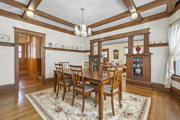 Formal dining room. Original built-ins hardwood floors and windows.
