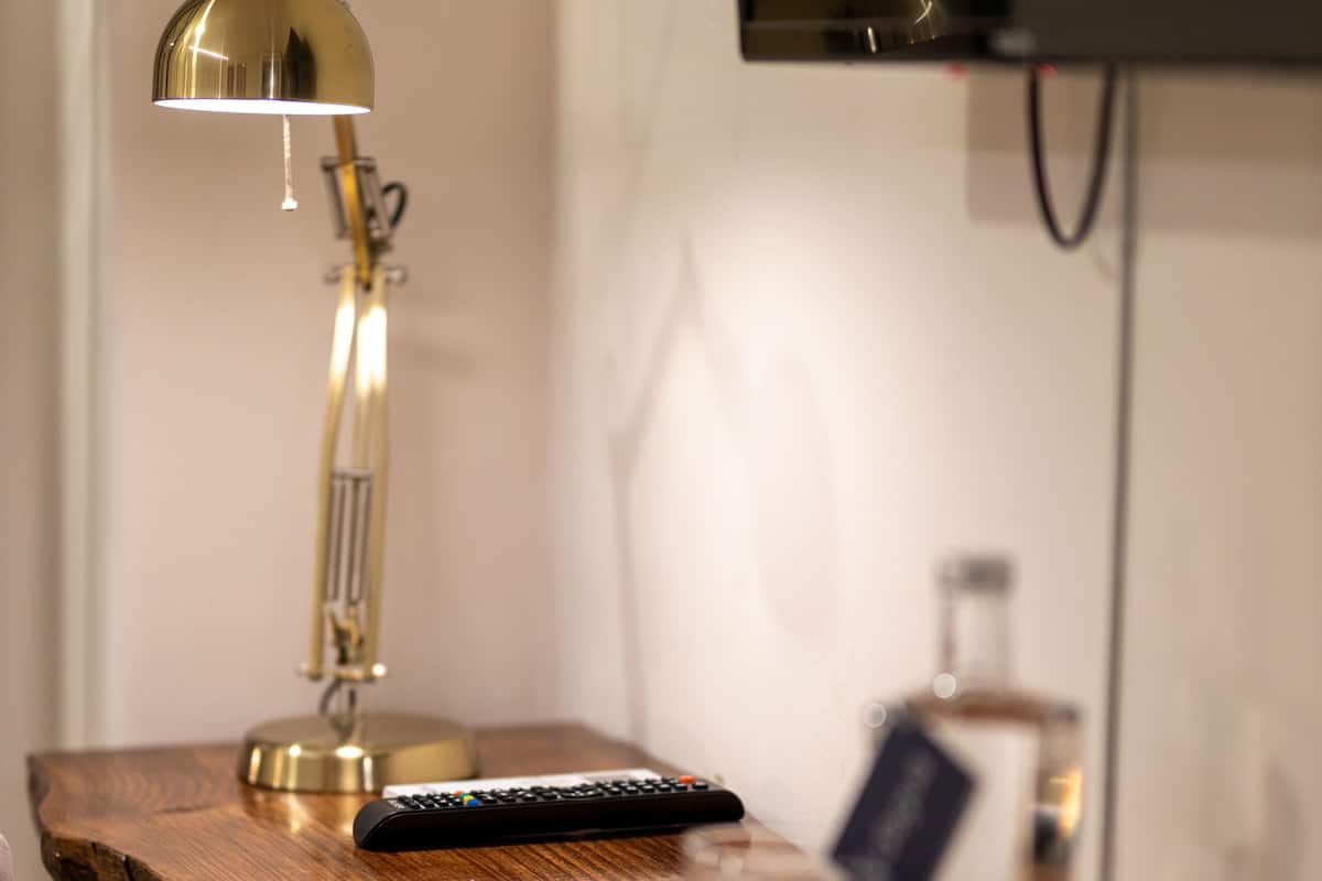 Habitación individual estándar | Cortinas blackout, wifi gratis y ropa de cama