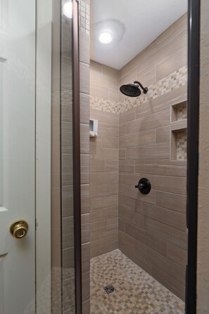 Shower, hair dryer, towels, soap