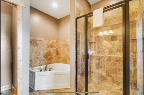 Shower, jetted tub, hair dryer, towels