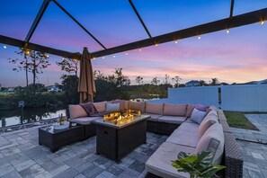 Terrace/patio - Outdoor Kitchen, Kayaks, Heated Pool, Canal Views  -  Villa Sip N' Sea - Roelens Vacations (Cape Coral)