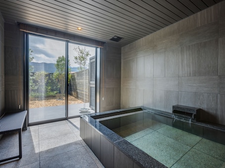 Premium Suite, Private Bathroom, Garden View (Dog Friendly) | Bathroom | Combined shower/tub, spring water tub, free toiletries, hair dryer