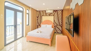 A bedroom with a large bed, a TV mounted on the wall, and a balcony with a railing. - S79 T68 Hotel Go Vap (Ho Chi Minh City)