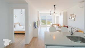 A modern, well-lit apartment with a kitchen, dining area, and a bedroom with a view. - CostaBlancaDreams - Real Ifach, El Gancho in Calpe (Calpe / Calp)