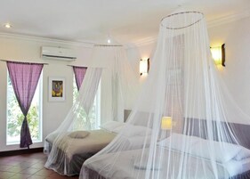 Deluxe Bungalow | Individually decorated, desk, laptop workspace, blackout drapes